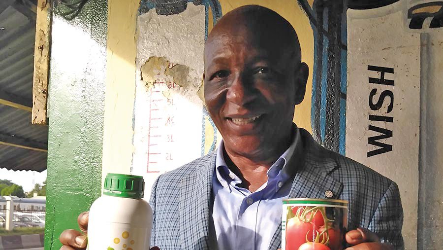 Diallo Amadou Tidiane with his products