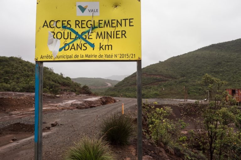 A defaced sign leading into the Goro minesite which references its former owner, minerals giant Vale. There were five reported acid leaks during its tenure. Image courtesy of Lachie Carracher.