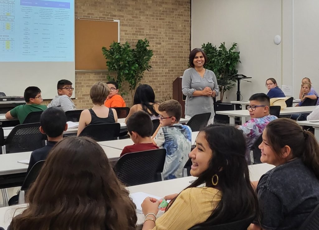 Dr. Madhumita Joshi with group of area  youth participating in the STEM program. 