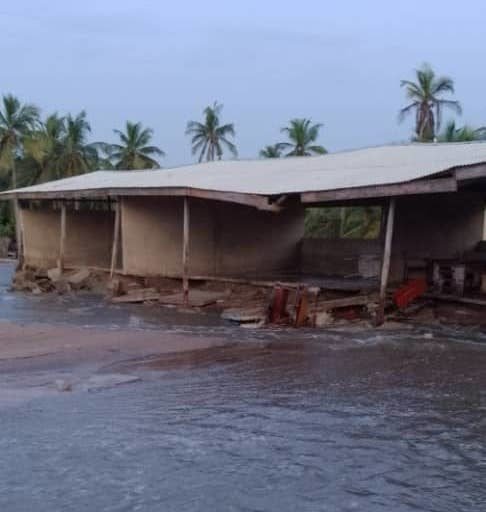 Damage to a school from the November 2021 storm surge. Image by Akorli Simon.