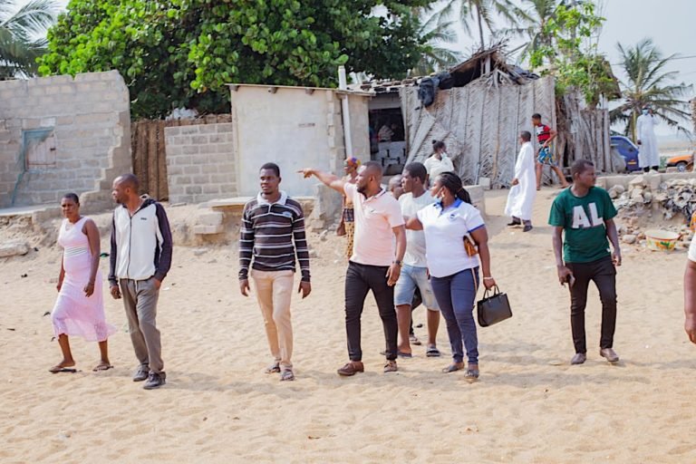 Sylvester Kumawu tours erosion damage in 2021. Image courtesy of Sylvester Kumawu.