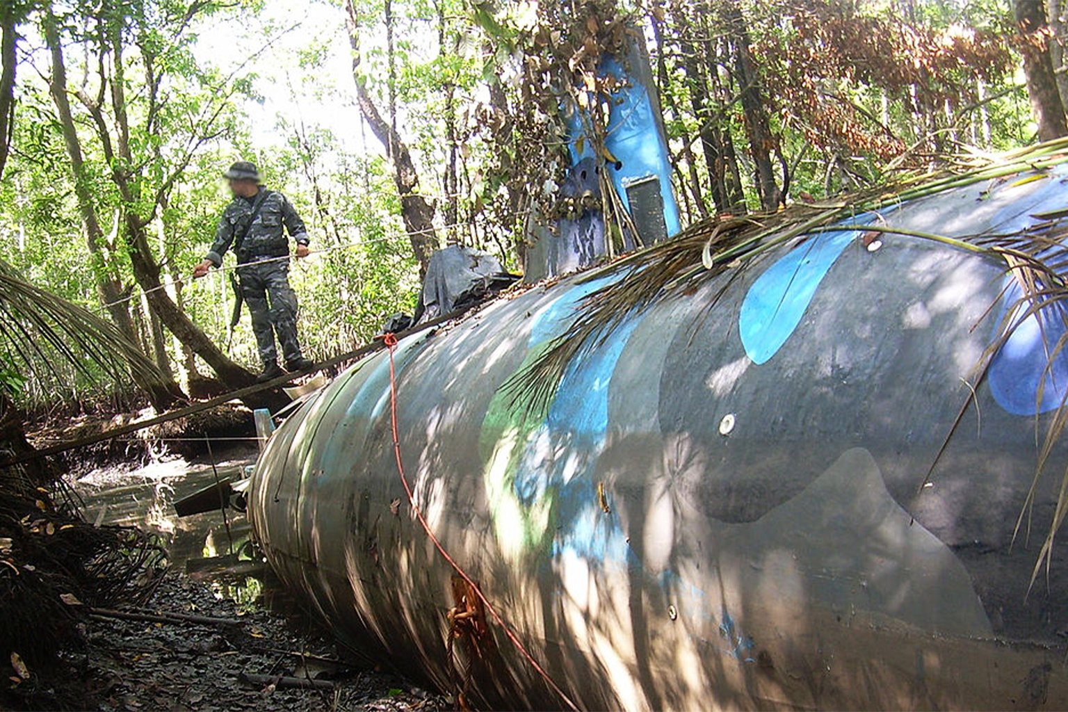 A fully operational submarine built for the primary purpose of transporting multiton shipments of cocaine found near a river tributary close to the Ecuador-Colombia border and seized by the Ecuador Anti-Narcotics Police Forces and Ecuador military with the assistance of the U.S. Drug Enforcement Administration. 