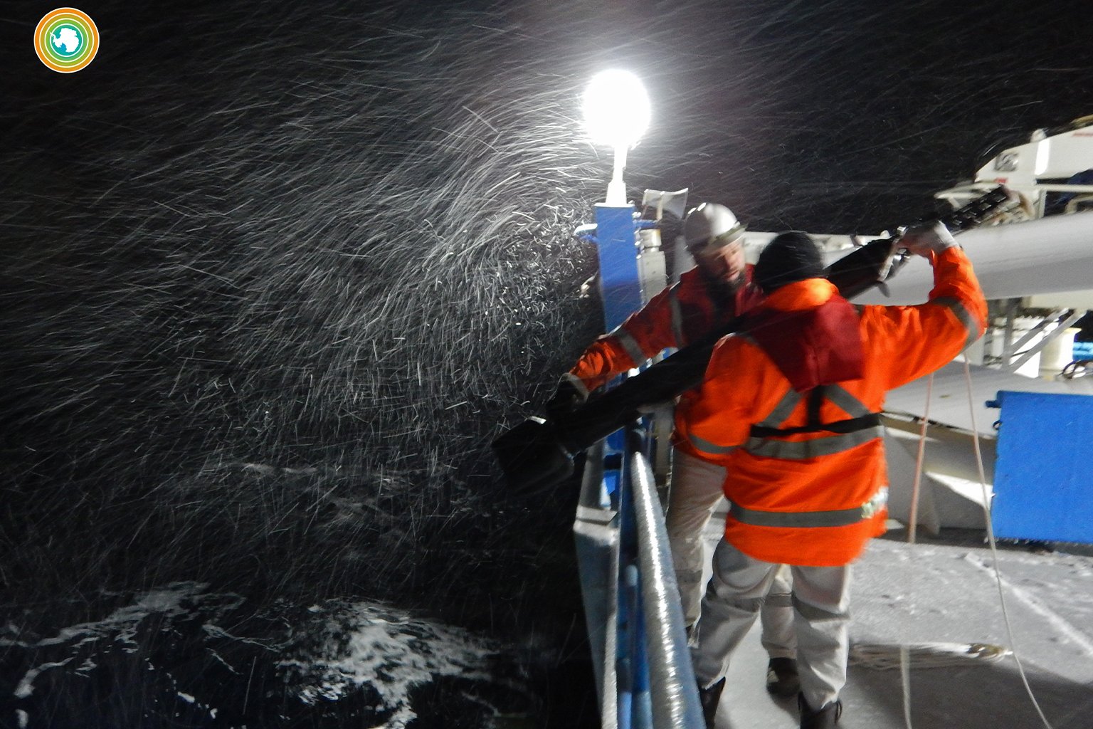 Launching a robot float in stormy weather.