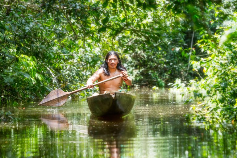 An Indigenous person in the Ecuadorean Amazon. Photo credit: Ammit. Licensed via Adobe Photo Stock