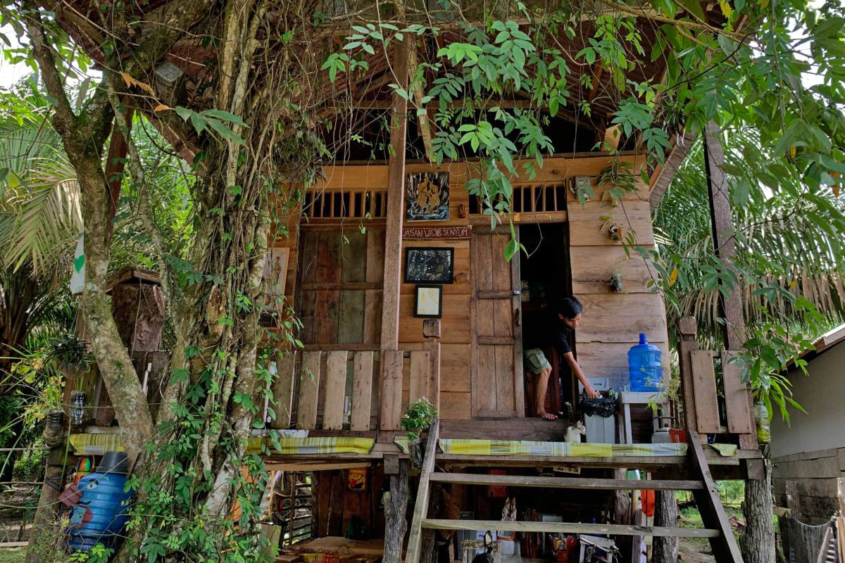 Menapo's house in Muara Jambi village.