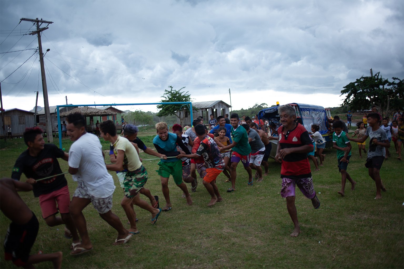 Disputes over land rights and consultation go further back than the potash mine. Here, residents of the Mura Indigenous village of Murutinga, in Brazil’s Amazonas state, take over a boat belonging to employees of the electricity company, who have come to cut off the community's power. The Mura, who have been struggling for land rights for decades, say they never agreed for the energy project to pass through their territory and were never consulted or compensated. Image by Ana Ionova for Mongabay.