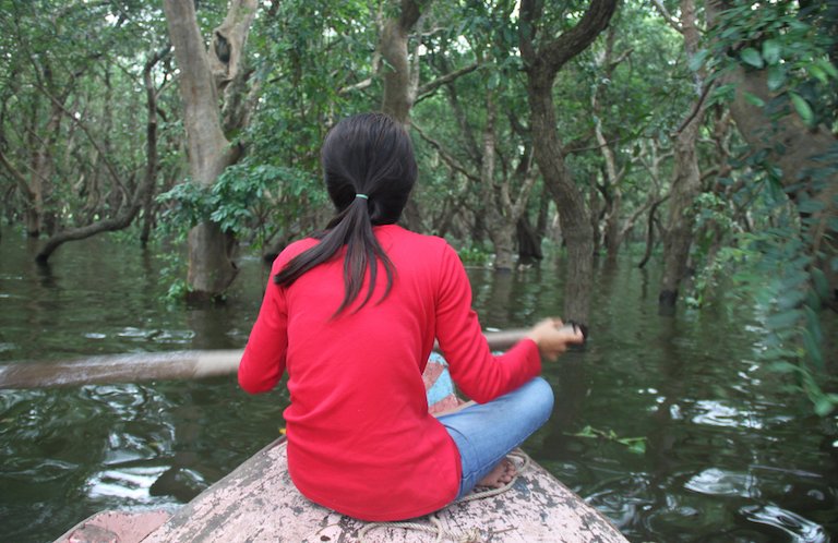 The forests that surround Tonle Sap are regularly flooded as the lake's water levels rise seasonally. Image in the public domain.