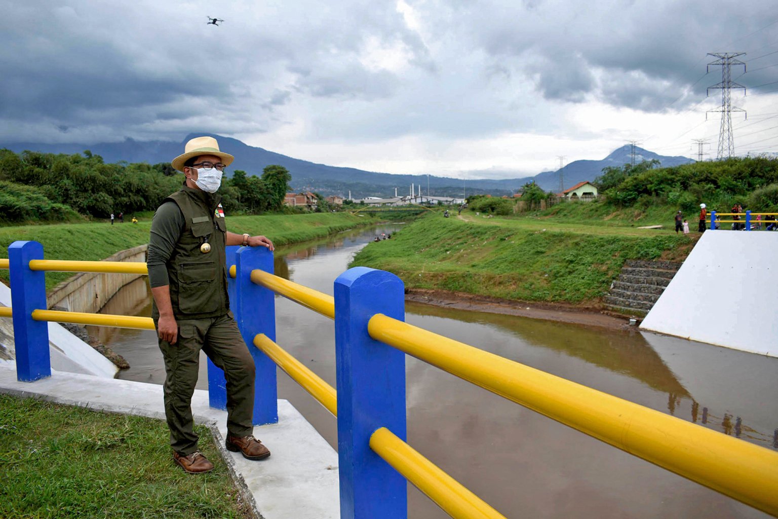 Governor Ridwan Kamil looks over the newly constructed Cisangkuy Floodway