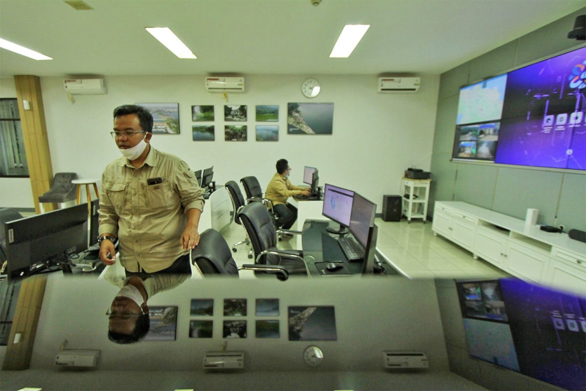 Shandy, left, at the command center in Bandung.