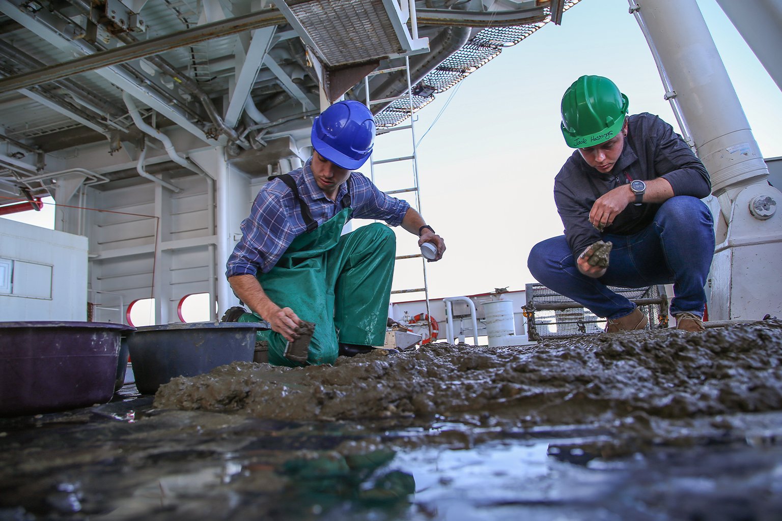 Researchers with sediment samples.