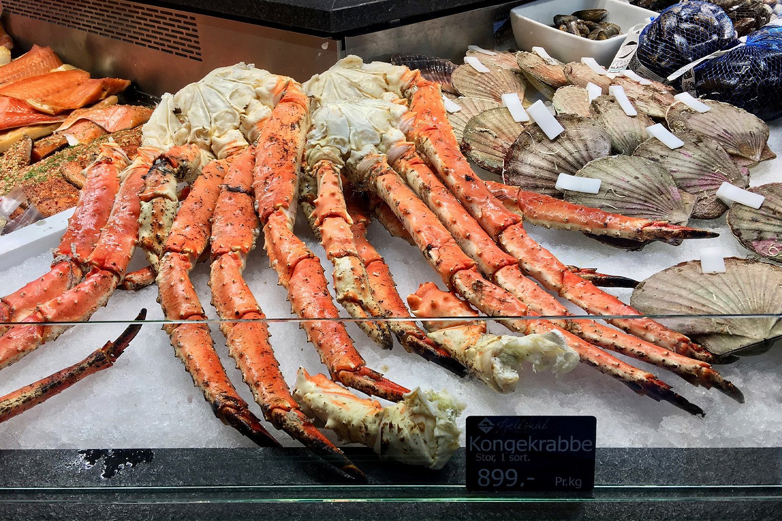 Red king crabs on display at a fish market.