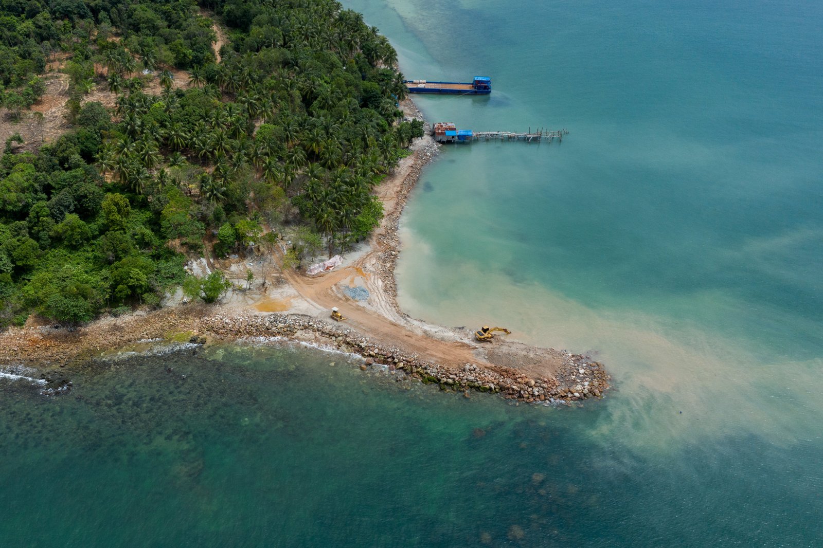 Development on Koh Toteung documented in September 2022 shows sediment spewing out into the coral and seagrass habitat.